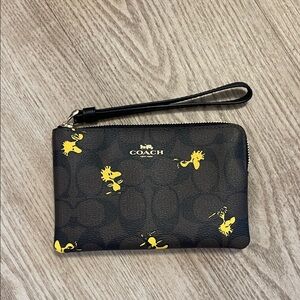Coach Black Wristlet with Yellow Design